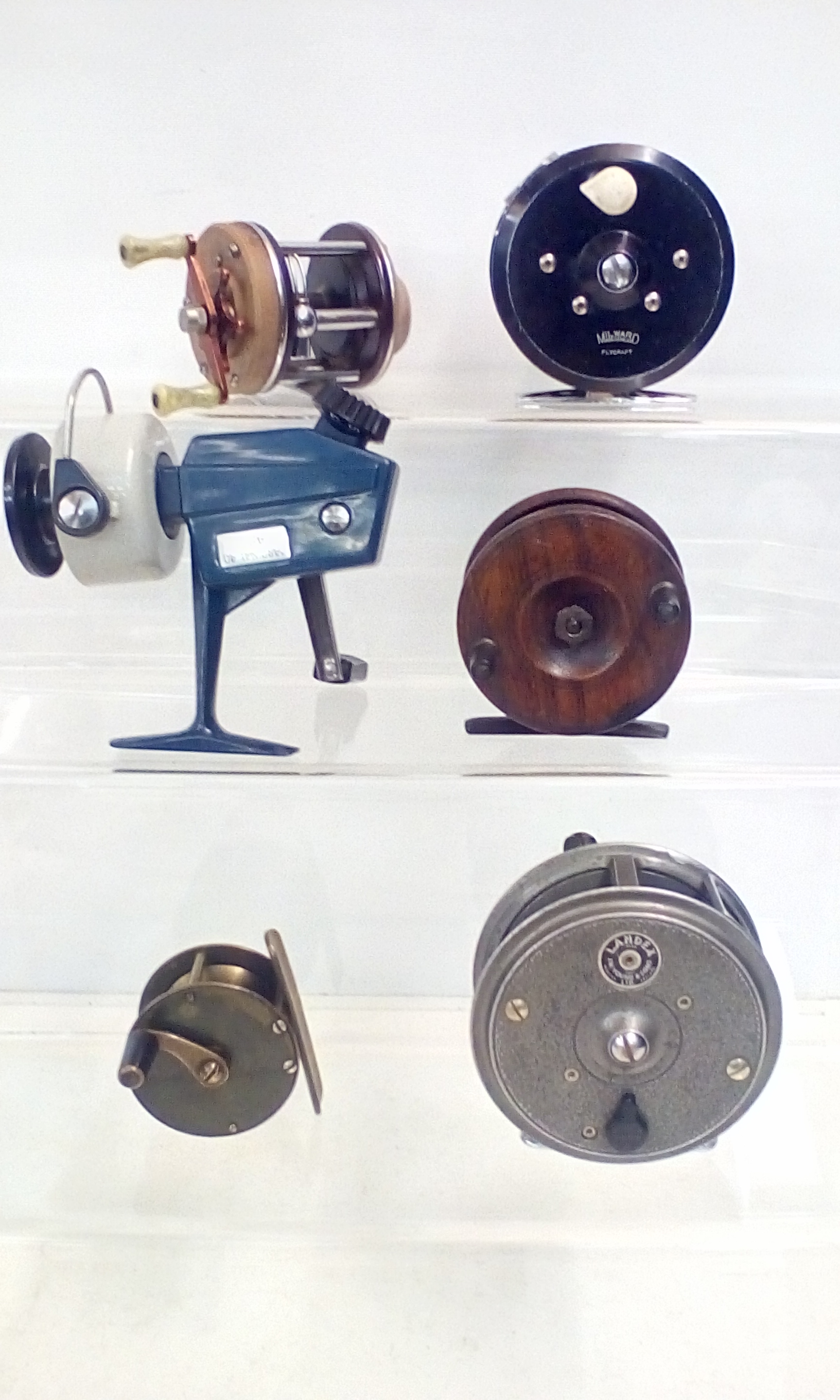 Six vintage fishing reels to include Milward and L