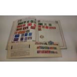 Stamp album containing world stamps