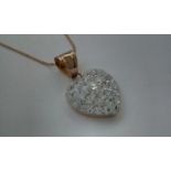 9 carat gold necklace and heart shaped pendant