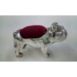 Silver pin cushion in the form of a bulldog