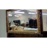 Gilt framed bevel edged wall mirror