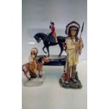 Two Native American figures in resin, together wit