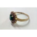 9 carat gold dress ring set with central emerald s