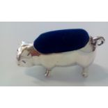 Silver pin cushion in the form of a pig