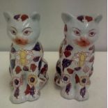 Pair of Chinese porcelain seated cats, late 20th c