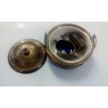 Silver plated and treen container with ceramic inn