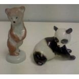 Twp Lomonosov figures, panda and bear, height of b