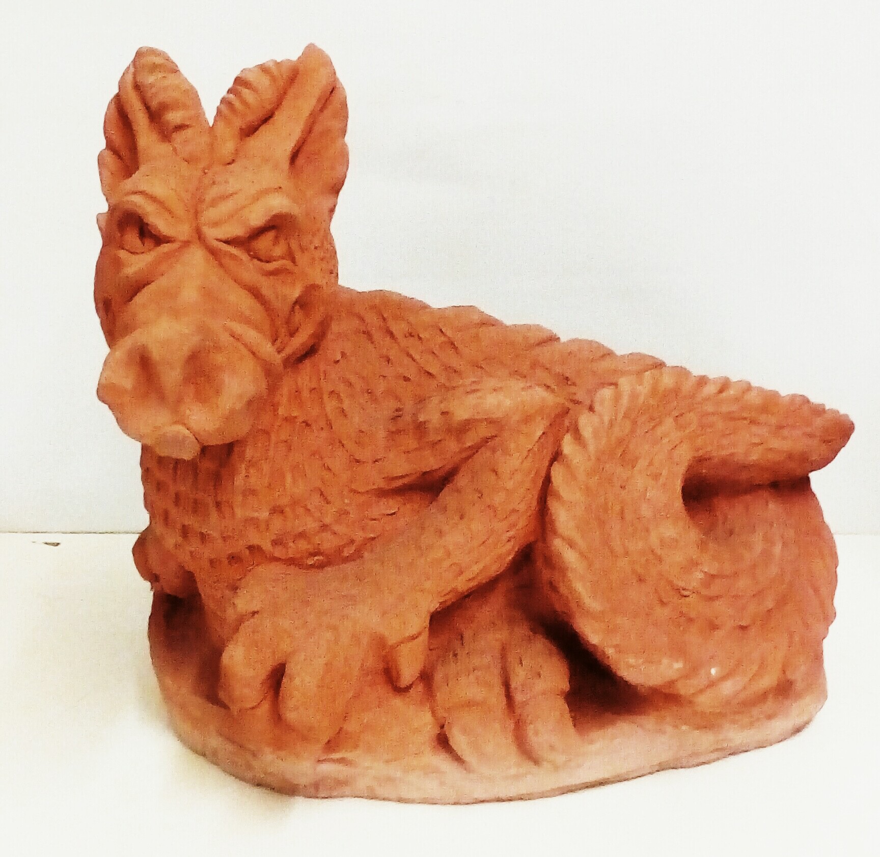 Terracotta figure of a recumbent dragon, height 32
