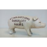 Quaker City Hams cast iron money box, length 20cm