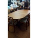 Extending dining room table, two carvers, four cha