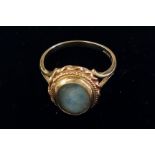 9 ct gold ring with central gemstone, size M