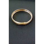 9 ct gold bangle, 7.3 grams