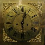 Early 19th century and carved later oak long case clock, brass dial with Roman and Arabic numerals