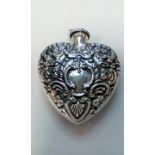 Silver sent bottle in the form of a hear