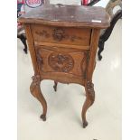 A French 19th century marble-topped bedside cabinet