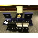 A quantity of boxed Swarovski jewellery sets;