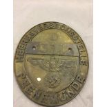 A bronze oval German plaque