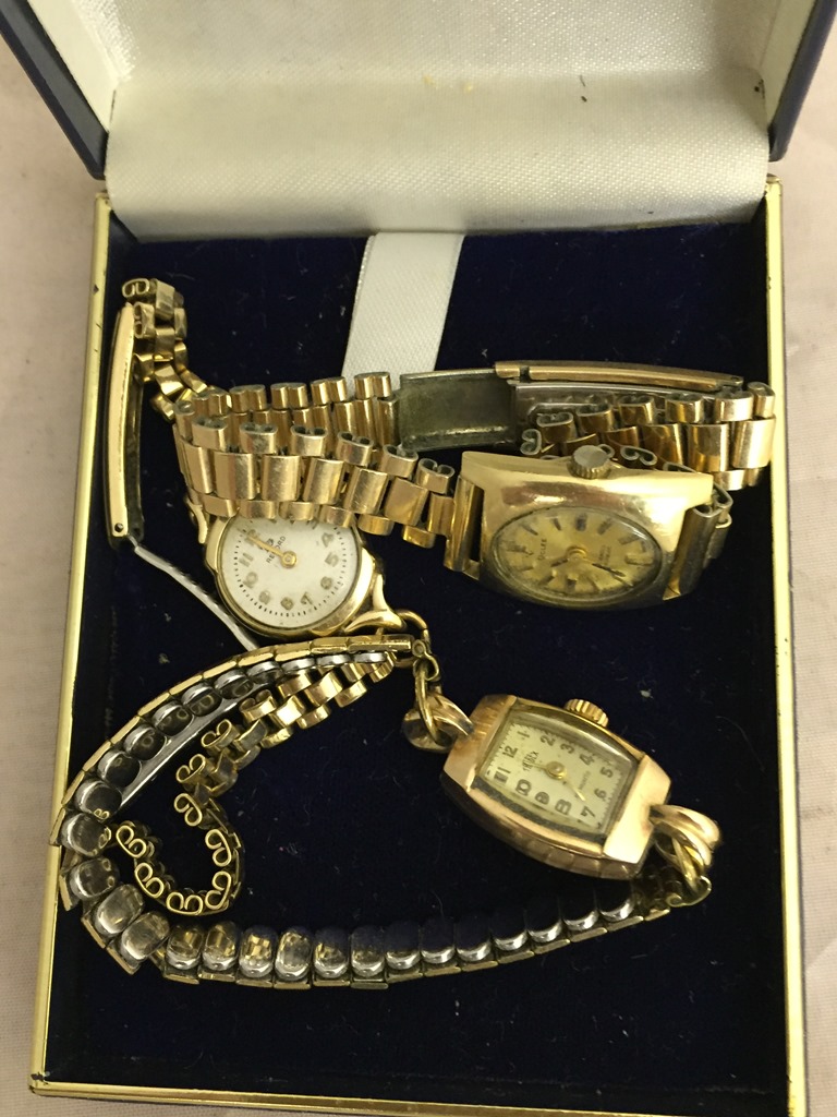 Three 9ct ladies watches