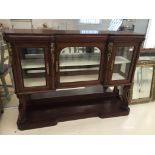 A 20th century mahogany and walnut display cabinet with brass mounts