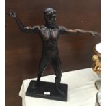 A bronze Greek male figure