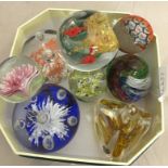 A quantity of paperweights