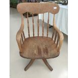 An oak Captain's chair,