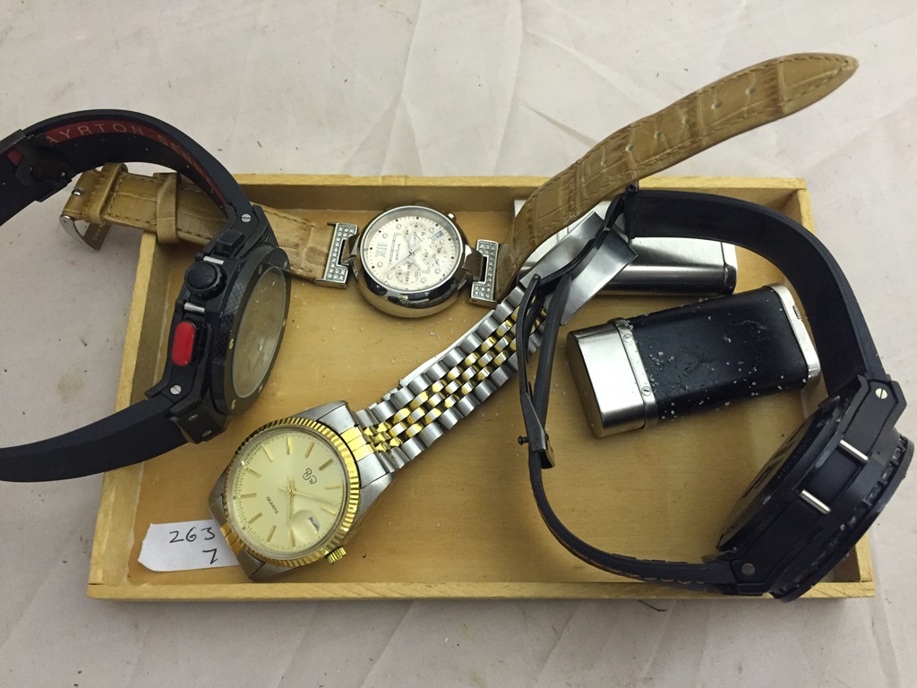 A quantity of dress watches and lighters