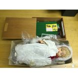 A vintage rosebud boxed doll and one other;