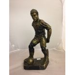 A bronzed figure of a footballer, signed 'Fallico' to back leg and 'Fabrication Francaise' to base,