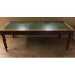 A 19th century mahogany leather-topped library table