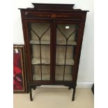 An edewardian mahogany inlaid display cabinet