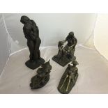 Four bronzed resin figures