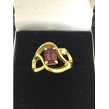 A 14ct gold American designer ring by Strellman: tourmaline and diamond