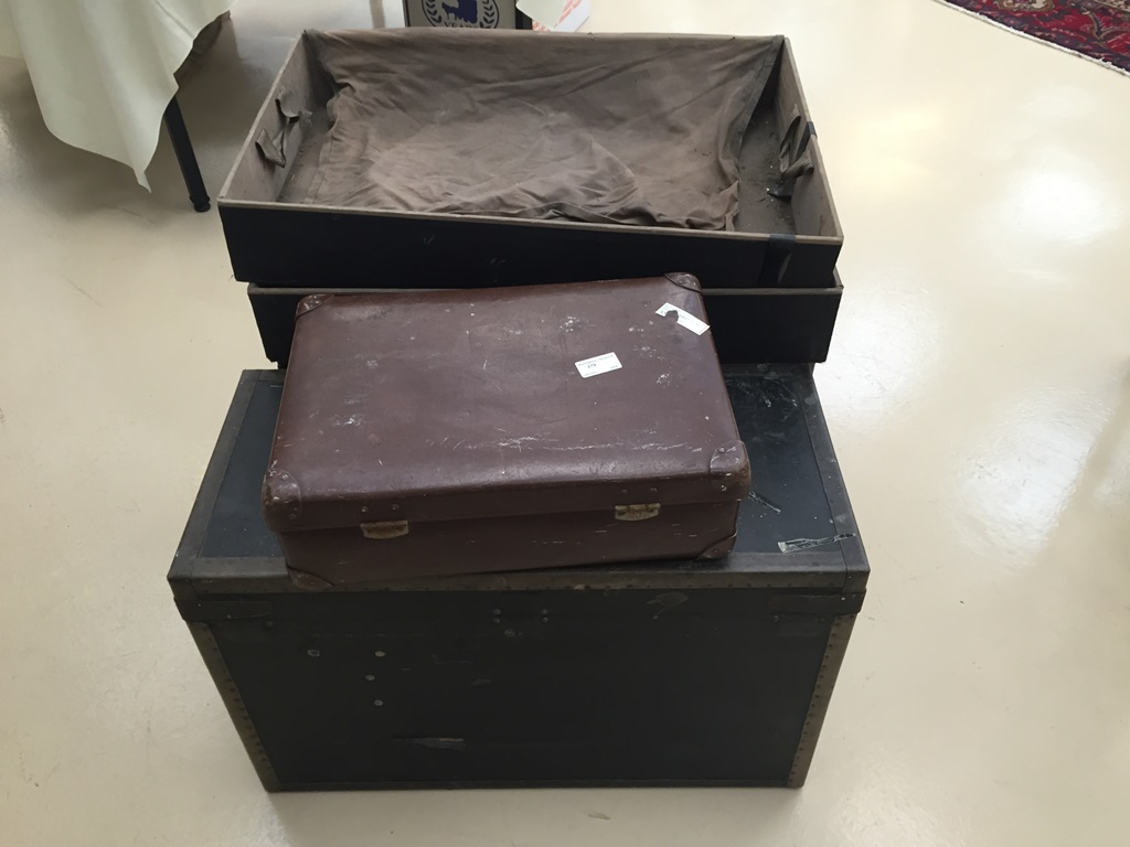 A pair of travel boxes;