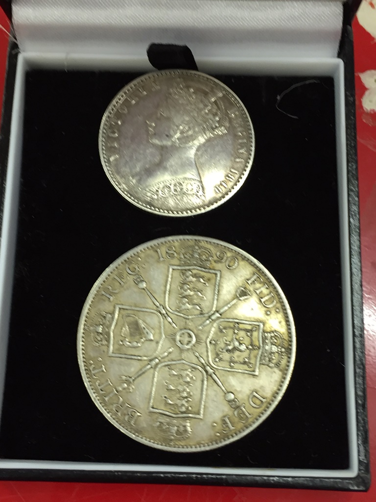 A 1849 Godless florin and 1890 double florin