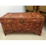 A carved Oriental trunk