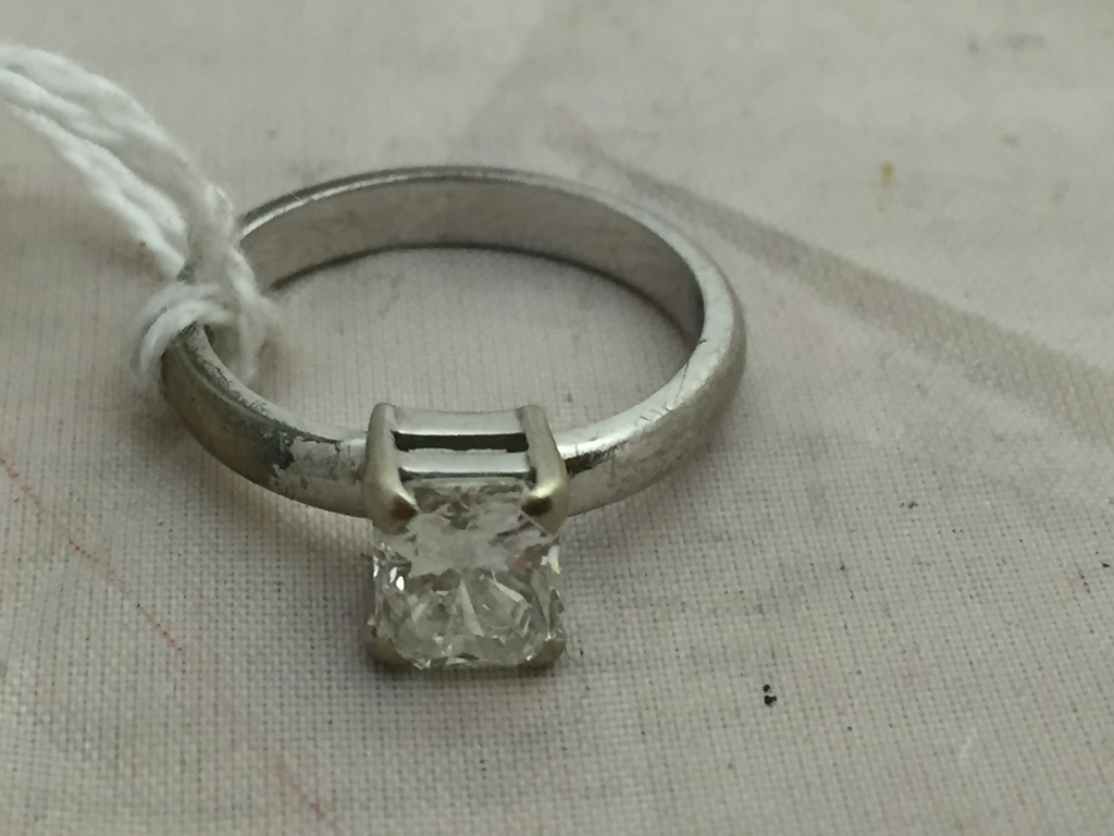 An 18ct white gold emerald cut diamond solitaire approx 1.