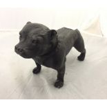 A bronze figure of a Staffordshire bull terrier