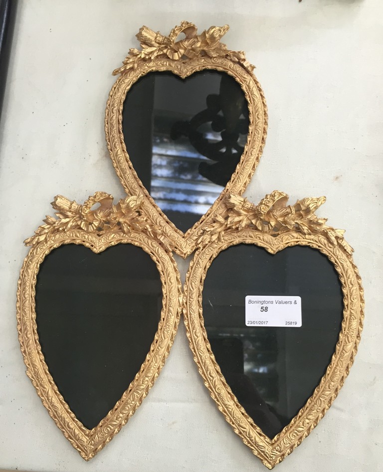 A triple heart-shaped photograph frame