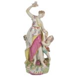 An 18th Century Chelsea Group: a standing figure, Minerva, holding birds above a cupid,