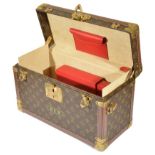 A Louis Vuitton Travelling Bookcase: In monogrammed LV livery,