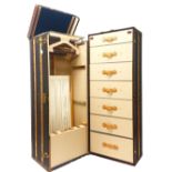 A Louis Vuitton Travelling Wardrobe: Of large proportions with monogrammed LV livery to outside,