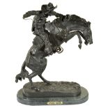 After Frederic Remington (1861-1906) Bronze "Bronco Buster" Fine detailed bronze,