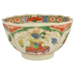 An 18th Century Worcester Polychrome Tea Bowl: the side reserves painted with utensils and