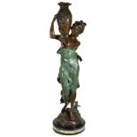 A Pair of Bronze Figures after Moreau: One of a woman holding a floral decorated vase,