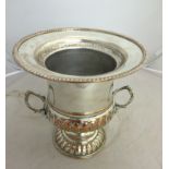 A silver-plated champagne bucket