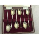 A cased set of hallmarked silver spoons