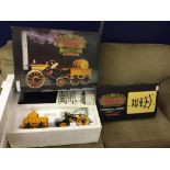 A boxed Hornby Stephenson's rocket steam train and pair of points;