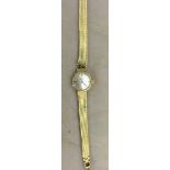 A ladies gold Omega wristwatch