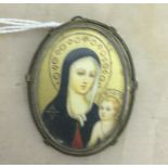 A 19th century German silver brooch with hand-painted Madonna and Child